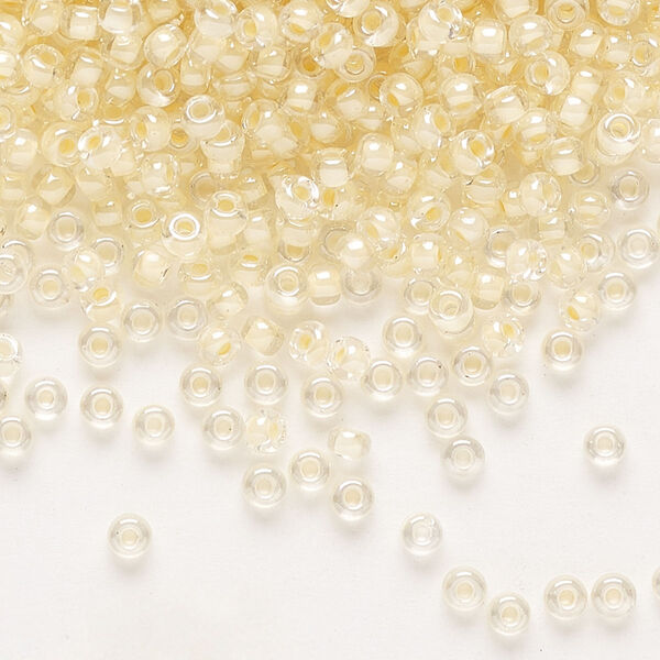 Seed bead, Miyuki, glass, pkg/250g, #8 rocaille, translucent ivory-lined luster crystal clear (RR-2215). image number 0