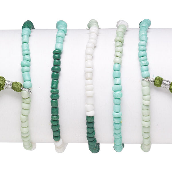 Bracelet mix, stretch, glass, white / teal / soft green, #6 round with 45mm tassel, 7-1/2 inches. Sold per pkg of 5. image number 0