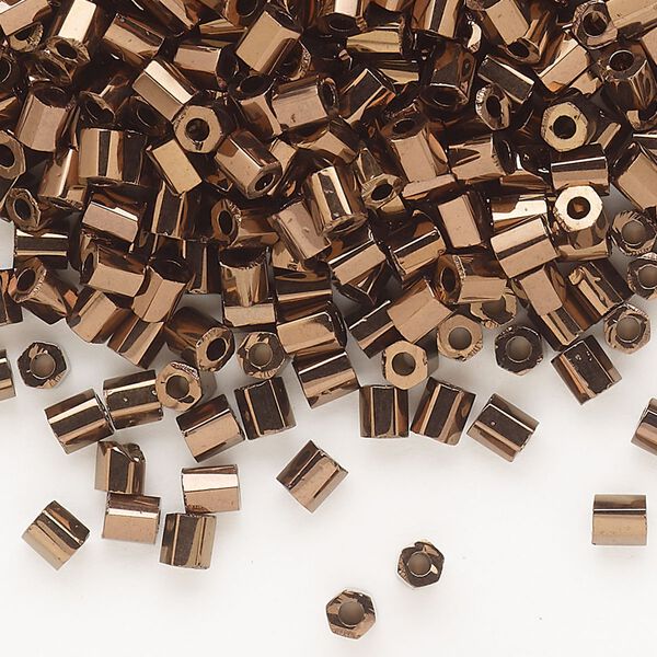 Seed bead, Dyna-Mites™, glass, opaque iris bronze, #6 hex 2-cut. Sold per 40-gram pkg. image number 0
