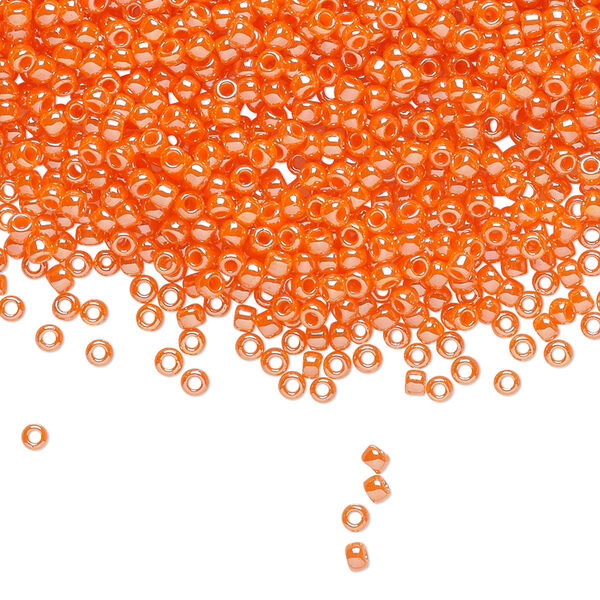 Seed bead, TOHO BEADS®, glass, pkg/250g, #11 round, opaque luster pumpkin (TR-11-129). image number 0