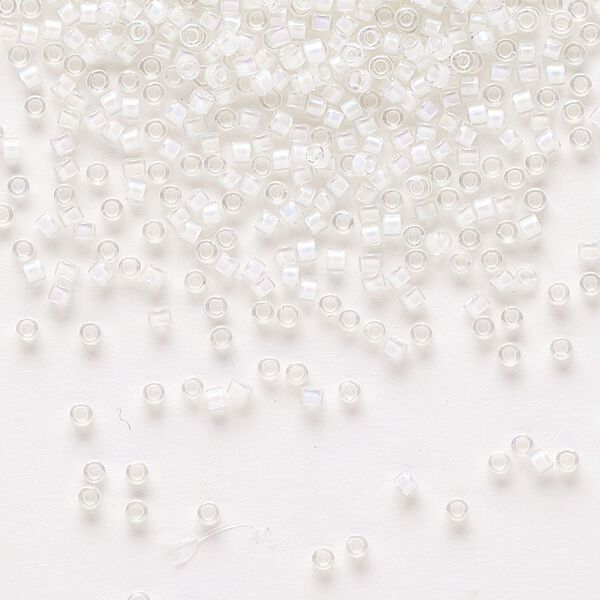 Seed bead, Delica®, glass, pkg/7.5g, #11 round, translucent white-lined rainbow crystal clear (DB-0066). image number 0
