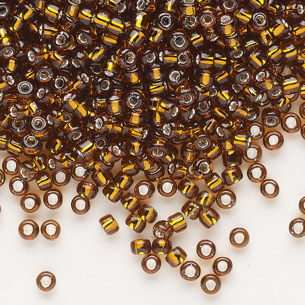 Seed bead, Dyna-Mites™, glass, silver-lined translucent root beer, #8 round. Sold per 40-gram pkg. image number 0