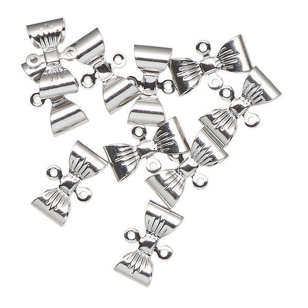 Link, antique silver-finished brass, 12x5mm textured bow. Sold per pkg of 10. image number 0