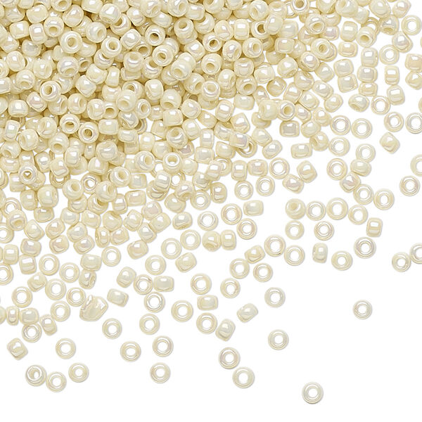 Seed bead, TOHO BEADS®, glass, pkg/250g, #11 round, opaque rainbow light beige (TR-11-409). image number 0
