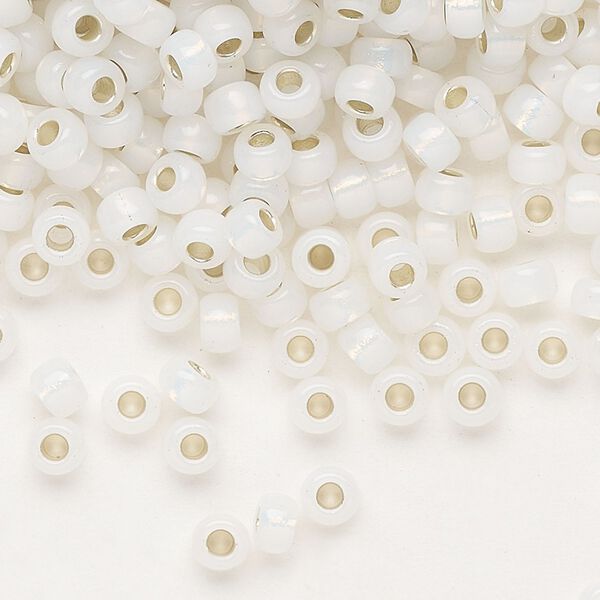 Seed bead, Miyuki, glass, pkg/25g, #6 rocaille, translucent silver-lined opal (RR-551). image number 0