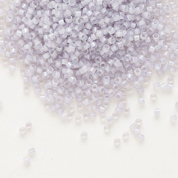 Seed bead, Delica®, glass, pkg/250g, #11 round, translucent pale violet-lined luster crystal clear (DB-0080). image number 0
