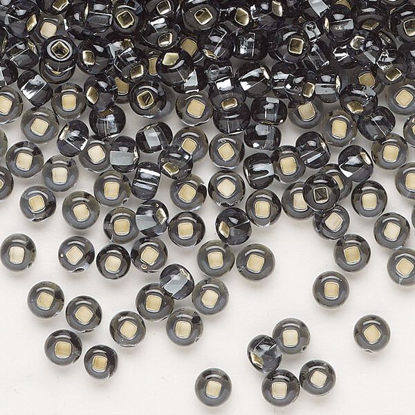 Seed bead, Preciosa Ornela Czech glass, pkg/500g, #6 rocaille, transparent silver-lined grey, (47010). image number 0