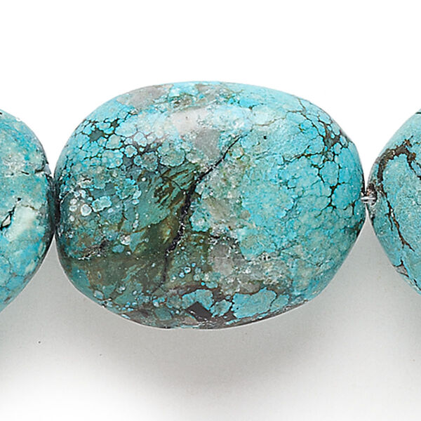 Bead, turquoise (dyed / waxed), 26x22mm-37x32mm graduated flat oval, C grade, Mohs hardness 5 to 6. Sold per 15" to 16" strand. image number 0
