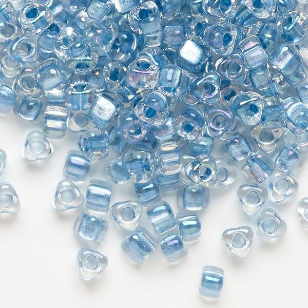 Seed bead, Miyuki, glass, transparent clear color-lined sea blue, (TR1137), #5 triangle. Sold per 25-gram pkg. image number 0