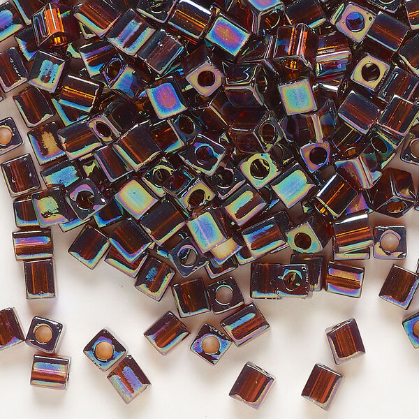 Seed bead, Miyuki, glass, pkg/25g, 3.5-3.7mm square, translucent rainbow dark amber yellow (SB-257). image number 0