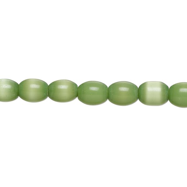 Bead, fiber optic glass, pkg/14 inch, opaque green, 6x5-8x6mm center-drilled oval. image number 0