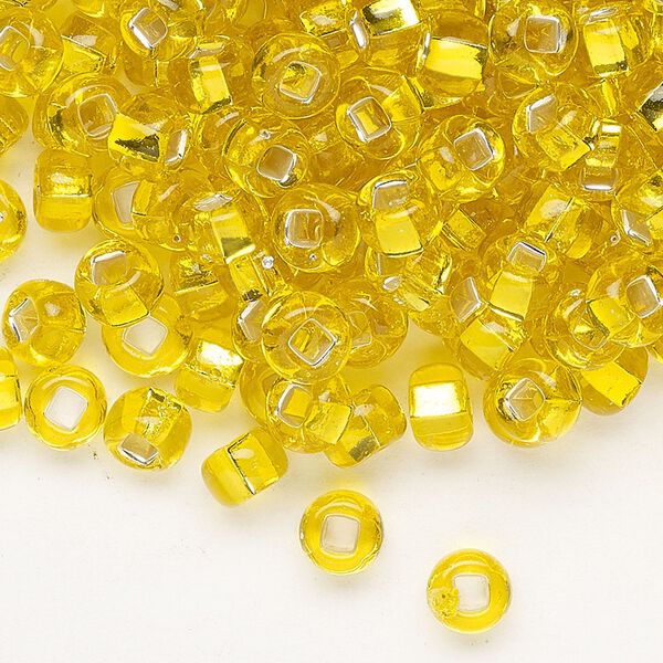 Seed bead, Preciosa Ornela, glass, transparent silver-lined yellow amber, #2 rocaille with square hole. Sold per 50-gram pkg. image number 0