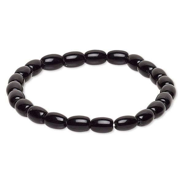 Bracelet, stretch, glass, black, 7x5mm-8x6mm barrel, 6-1/2 inches. Sold individually. image number 0