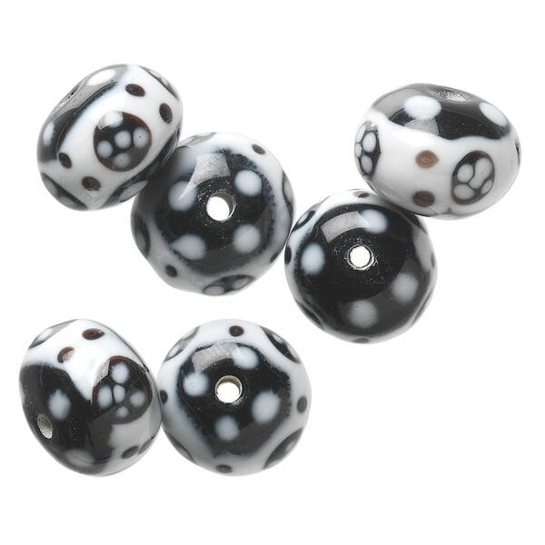 Bead, lampworked glass, opaque white and black, 15x11mm-17x12mm rondelle with flower and dot design. Sold per pkg of 6. image number 0