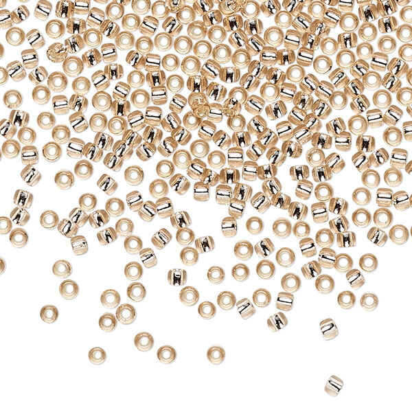 Seed bead, TOHO BEADS®, glass, pkg/250g, #11 round, transparent silver-lined rosaline (TR-11-31). image number 0