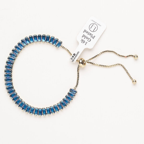 Bracelet, adjustable, brass / glass / silicone, pkg/1, 6 to 10 inches, gold plate and blue topaz. image number 0