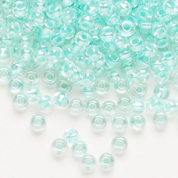 Seed bead, Preciosa Ornela Czech glass, pkg/50g, #6 rocaille, translucent color-lined luster pastel green, (382PG). image number 0