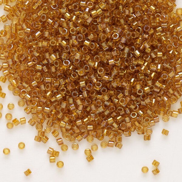 Seed bead, Delica®, glass, pkg/50g, #11 round, translucent topaz-lined luster topaz (DB-0065). image number 0