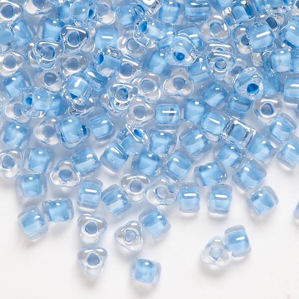 Seed bead, Miyuki, glass, transparent clear color-lined sky blue, (TR1116), #5 triangle. Sold per 250-gram pkg. image number 0