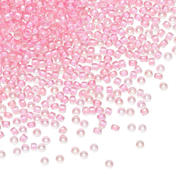 Seed bead, TOHO BEADS®, glass, pkg/50g, #11 round, opaque rainbow hot pink-lined crystal clear (TR-11-191B). image number 0