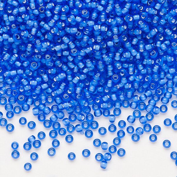 Seed bead, Preciosa Ornela, glass, transparent chalkwhite-lined sapphire, #11 rocaille. Sold per 500-gram pkg. image number 0