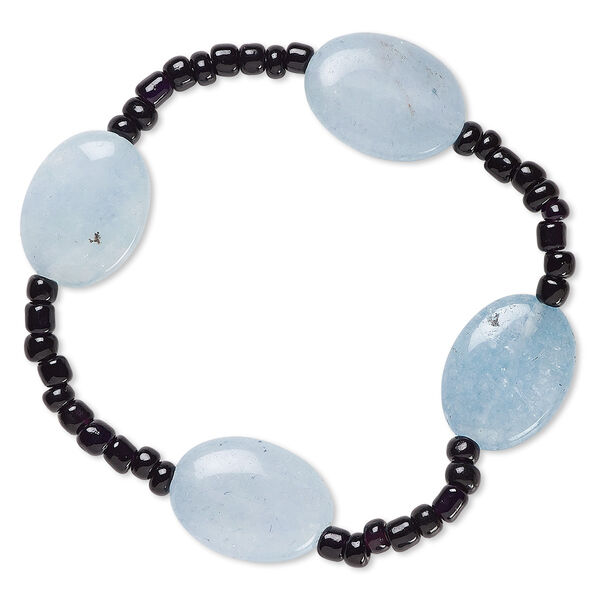 Bracelet, stretch, quartz (dyed) and glass, black and opaque blue, 3mm-5x4mm rondelle and 20x15mm-21x16mm puffed oval, 7-1/2 inches. Sold individually. image number 0