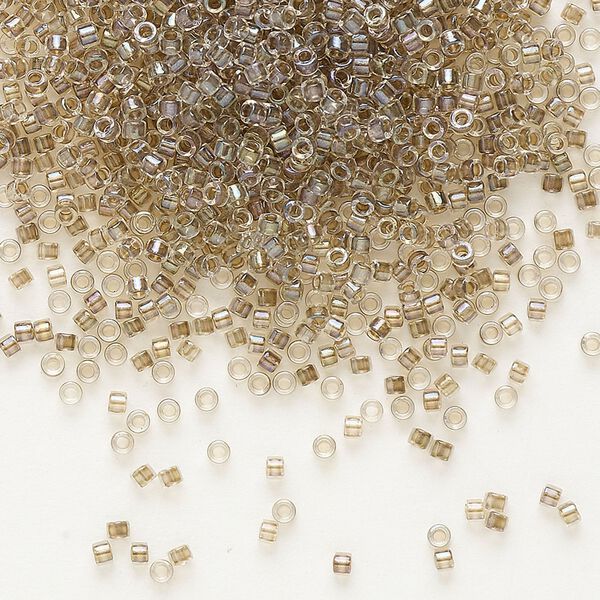 Seed bead, Delica®, glass, pkg/7.5g, #11 round, translucent taupe-lined luster crystal clear (DB-0064). image number 0