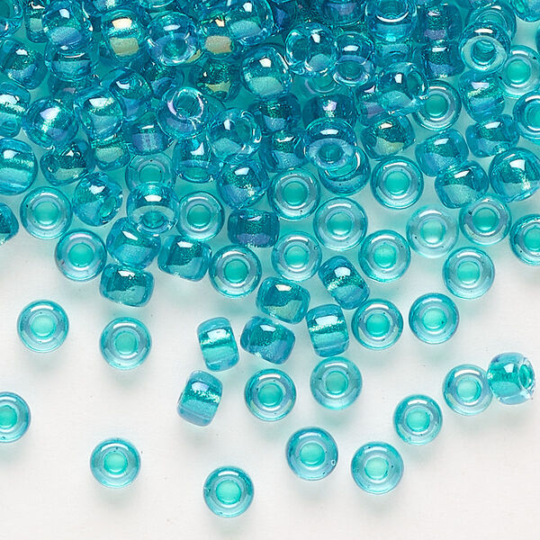 Seed bead, Miyuki, glass, pkg/250g, #6 rocaille, translucent teal-lined luster crystal clear (RR-3742). image number 0