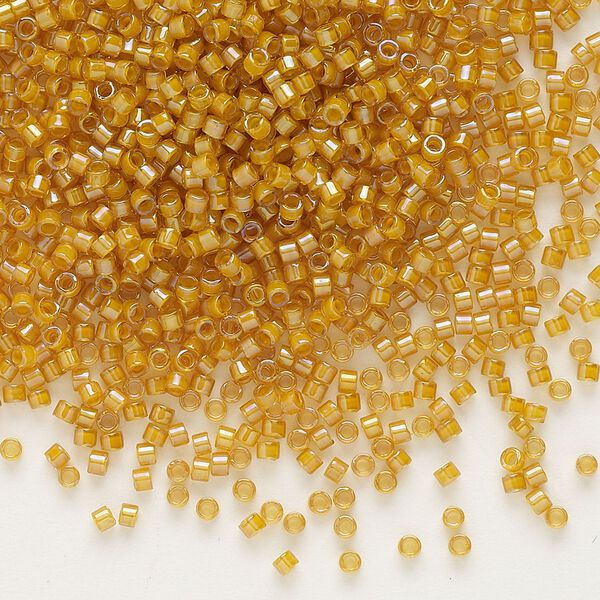Seed bead, Delica®, glass, pkg/50g, #11 round, translucent goldenrod-lined luster topaz (DB-0272). image number 0