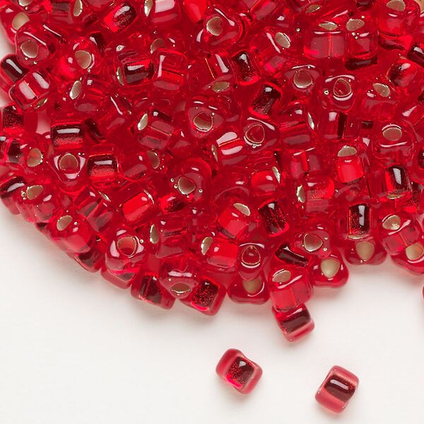 Seed bead, Miyuki, glass, silver-lined translucent red, (TR1808), #5 triangle. Sold per 25-gram pkg. image number 0