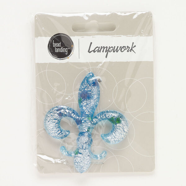 Focal, lampworked glass, opaque and translucent aqua blue / dark blue / green, 60x49mm fleur-de-lis with silver-colored foil. Sold individually. image number 0