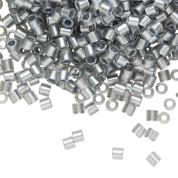 Seed bead, Delica®, glass, pkg/50g, #8 round, translucent silver grey-lined luster crystal clear (DBL-0271). image number 0