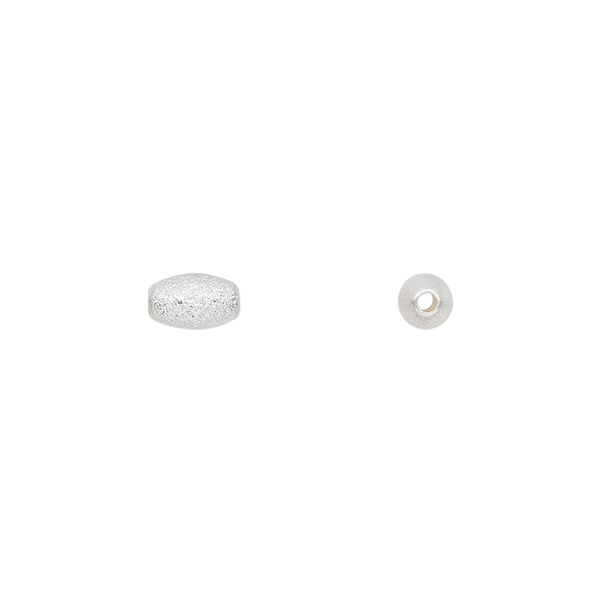 Bead, sterling silver, 7x4mm textured oval. Sold per pkg of 10. image number 0
