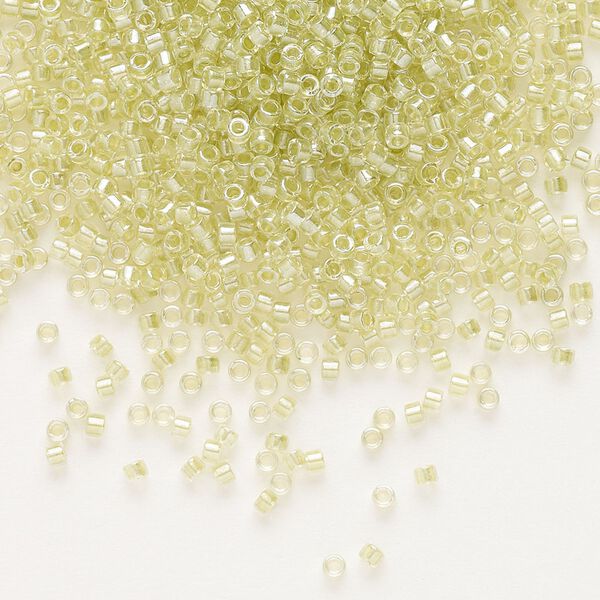 Seed bead, Delica®, glass, pkg/250g, #11 round, translucent peridot green-lined luster crystal clear (DB-0903). image number 0