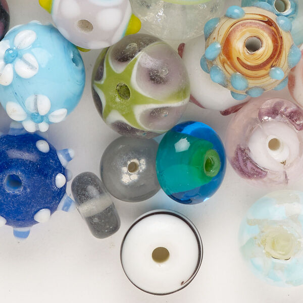 Bead mix, lampworked glass, opaque and translucent multicolored, 7x5mm-17x11mm rondelle. Sold per 4-ounce pkg, approximately 45 beads. image number 0
