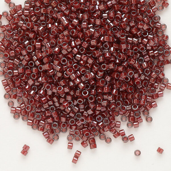 Seed bead, Delica®, glass, pkg/250g, #11 round, translucent cranberry-lined luster crystal clear (DB-0280). image number 0