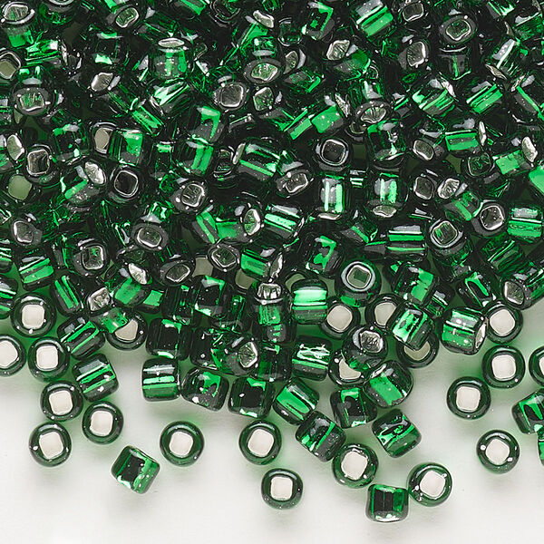 Seed bead, Dyna-Mites™, glass, silver-lined translucent emerald green, #6 round with square hole. Sold per 40-gram pkg. image number 0