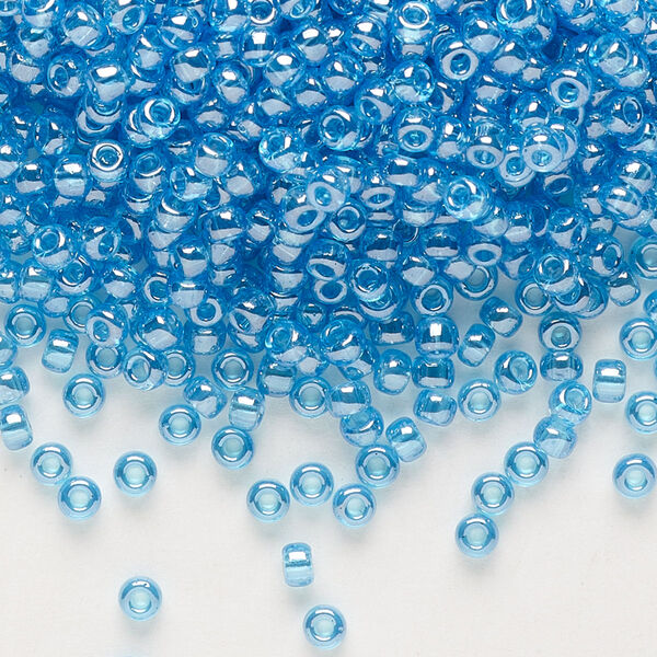 Seed bead, Miyuki, glass, pkg/250g, #8 rocaille, translucent luster ocean blue, (RR-321D). image number 0
