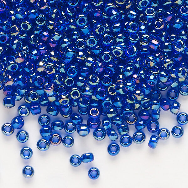 Seed bead, Dyna-Mites™, glass, transparent rainbow iris blue, #8 round. Sold per 40-gram pkg. image number 0