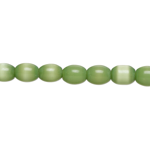Bead, fiber optic glass, pkg/14 inch, opaque green, 6x5-8x6mm center-drilled oval. image number 0