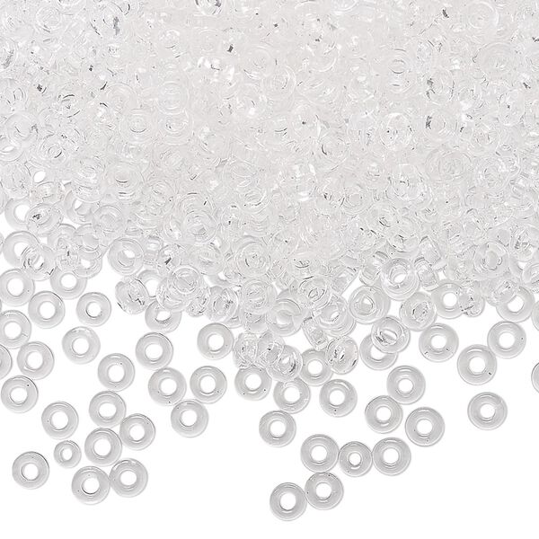 Seed bead, Miyuki, glass, pkg/250g, 3x1.3mm spacer rondelle, transparent clear, (SPR3-131). image number 0