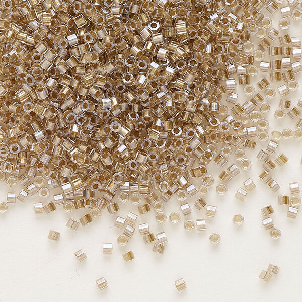Seed bead, Delica®, glass, pkg/250g, #11 cut, translucent beige-lined luster crystal clear (DBC-0907). image number 0