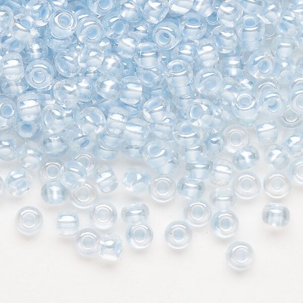 Seed bead, Preciosa Ornela Czech glass, pkg/50g, #6 rocaille, translucent color-lined luster pastel blue, (382PB). image number 0