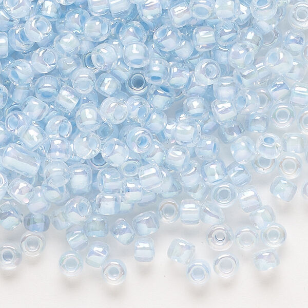 Seed bead, Dyna-Mites™, glass, transparent rainbow inside color ice blue, #6 round. Sold per 1/2 kilogram pkg. image number 0