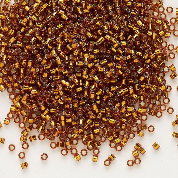 Seed bead, Delica®, glass, pkg/50g, #11 round, transparent silver-lined dark topaz (DB-0144). image number 0