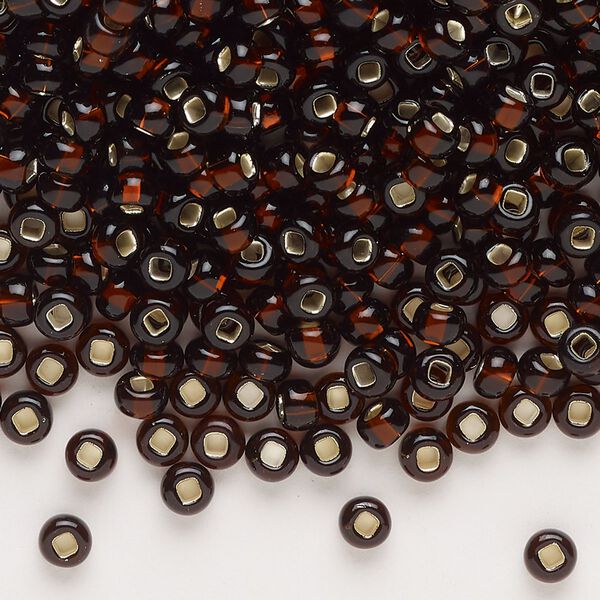 Seed bead, Preciosa Ornela Czech glass, pkg/500g, #6 rocaille, transparent silver-lined root beer, (17140). image number 0