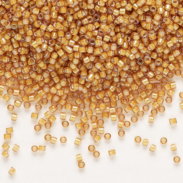 Seed bead, Delica®, glass, pkg/250g, #11 round, translucent white-lined luster topaz (DB-1778). image number 0