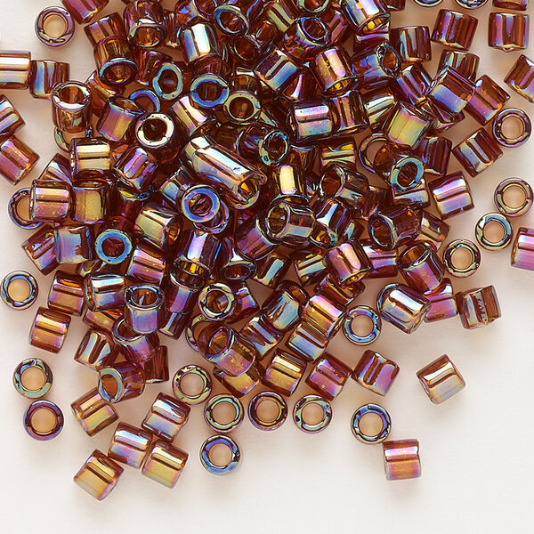 Seed bead, Delica®, glass, pkg/50g, #8 round, translucent rainbow topaz (DBL-0170). image number 0