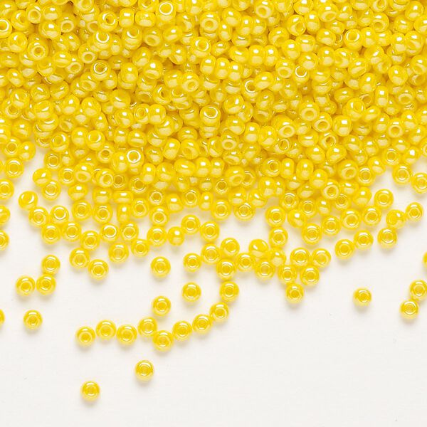 Seed bead, Preciosa Ornela, glass, opaque luster yellow, #11 rocaille. Sold per 500-gram pkg. image number 0