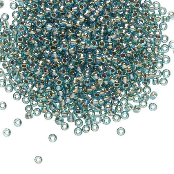 Seed bead, TOHO BEADS®, glass, pkg/7.5g, #11 round, translucent gold-lined rainbow aqua (TR-11-995). image number 0